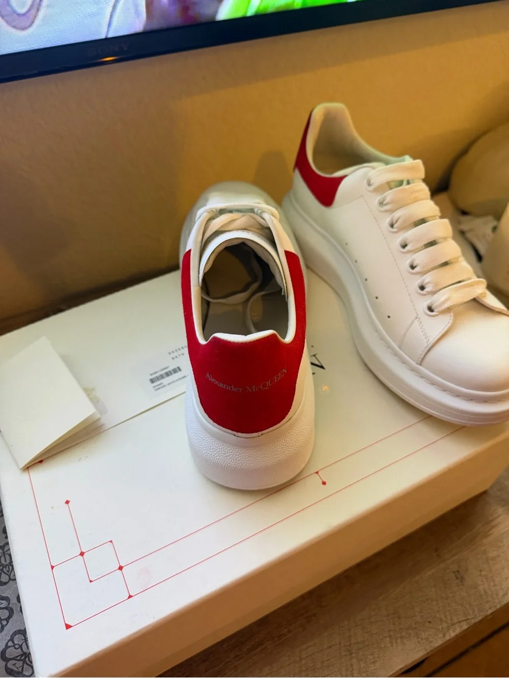 Alexander McQueen White Sneakers with Red Heel Tab